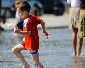 Carmel Valley San Diego Community | Dr. de Freitas | Boy Playing in the Water