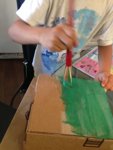 Carmel Valley San Diego Community | Kristin Rude | Boy Painting a Cardboard Box