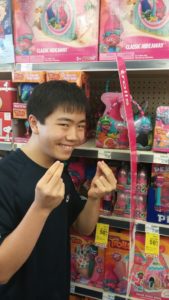 Carmel Valley San Diego Community | Perry Chen | 11-23-16-Perry-with-Trolls-merchandise-at-CVS-Pharmacy